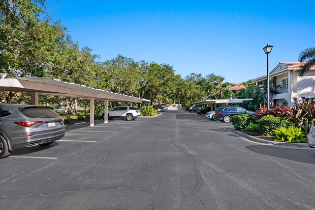 view of parking with a carport