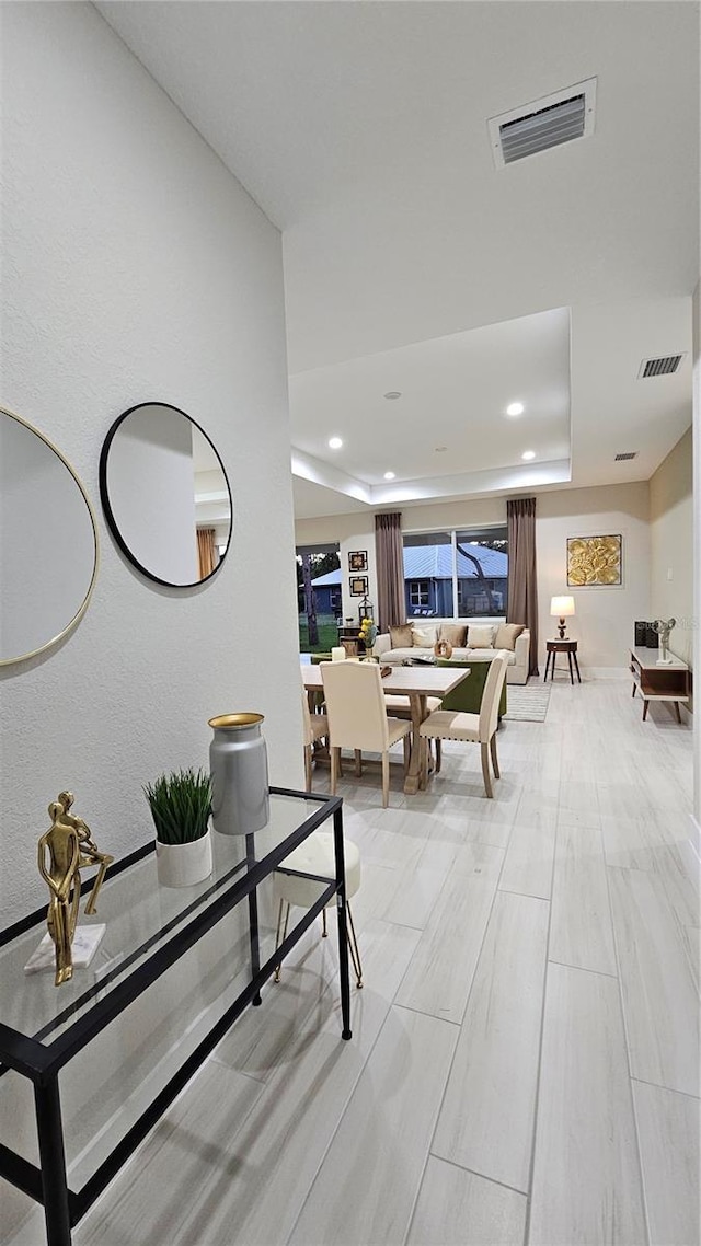 1859 Lamont St, North Port, FL 34288 - dining space featuring a tray ceiling, recessed lighting, and baseboards