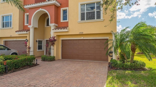 view of front of home with a garage