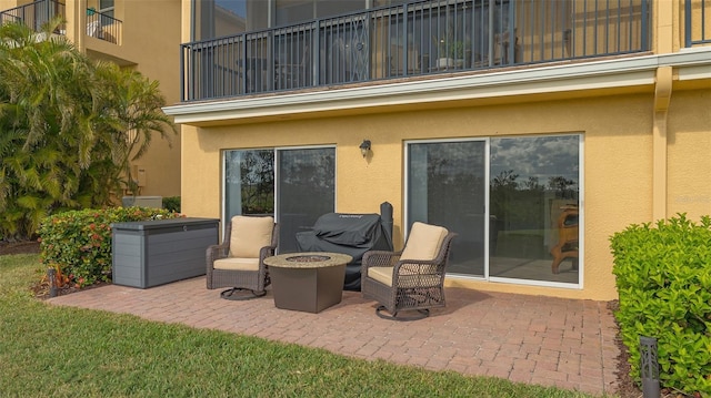 view of patio / terrace with a balcony