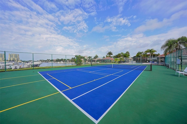 view of tennis court featuring basketball court