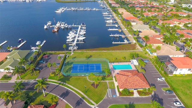 birds eye view of property featuring a water view