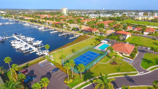 birds eye view of property with a water view