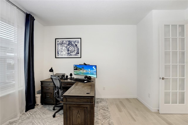 home office featuring light wood-type flooring