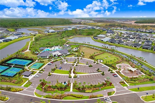 birds eye view of property featuring a water view