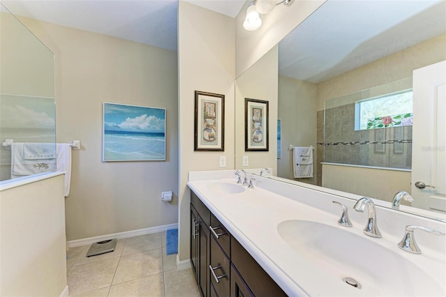 1387 Still River Dr, Venice, FL 34293 - bathroom featuring double vanity, tile patterned flooring, and walk in shower