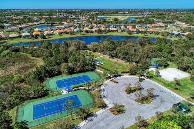 drone / aerial view with a water view