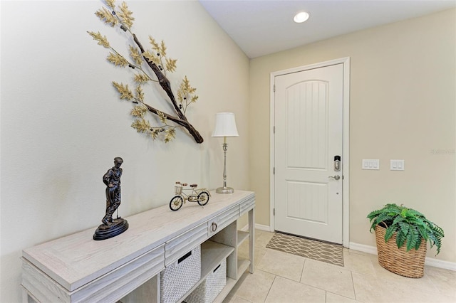 view of tiled foyer entrance