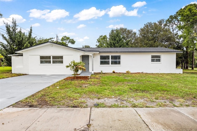 ranch-style house with a front lawn