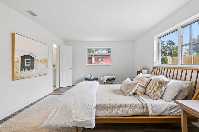 bedroom featuring wood-type flooring