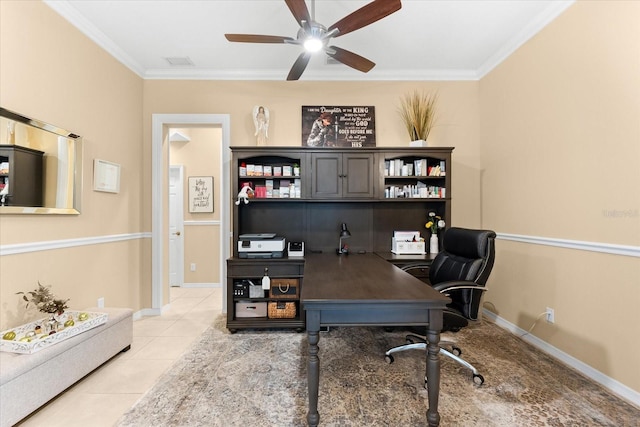 home office featuring ornamental molding, ceiling fan, and light tile patterned flooring