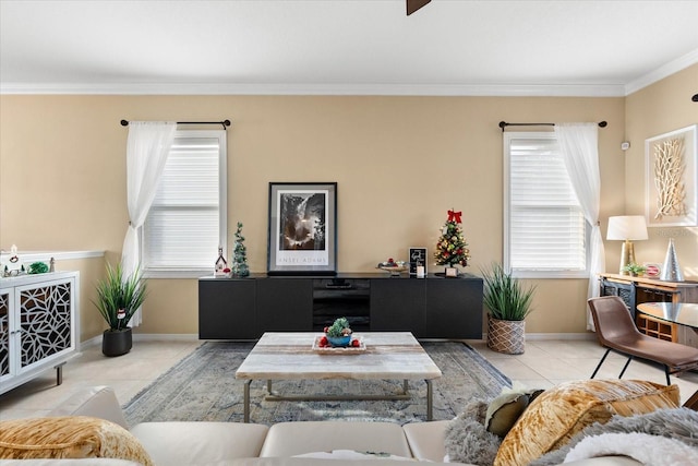 living room with light tile patterned floors and crown molding