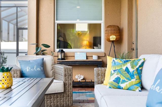 view of patio / terrace with a lanai