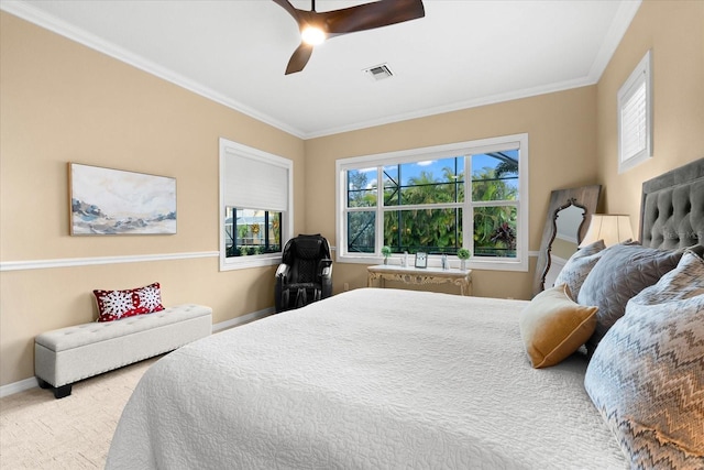 bedroom featuring ornamental molding and ceiling fan