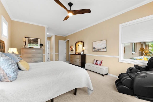 carpeted bedroom with crown molding and ceiling fan