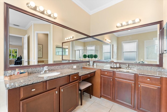 bathroom featuring ornamental molding, vanity, tile patterned floors, and walk in shower