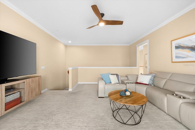 living room featuring light colored carpet, ornamental molding, and ceiling fan