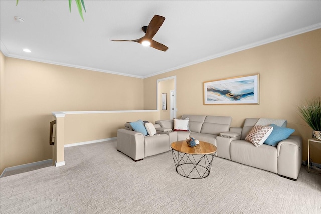 living room with light carpet, crown molding, and ceiling fan