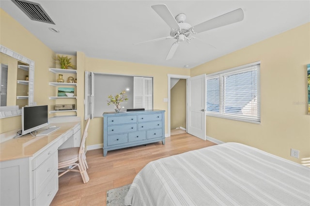 bedroom with ceiling fan and light hardwood / wood-style flooring