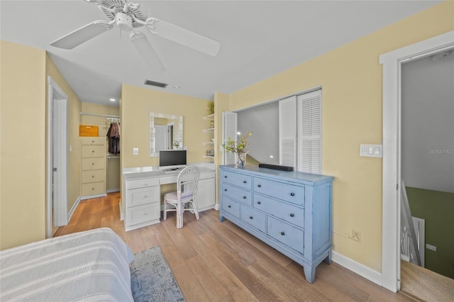 bedroom featuring light hardwood / wood-style flooring and ceiling fan