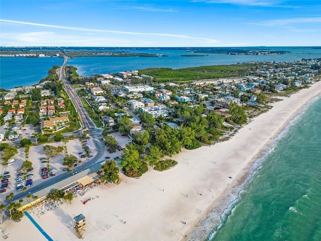 aerial view featuring a view of the beach and a water view