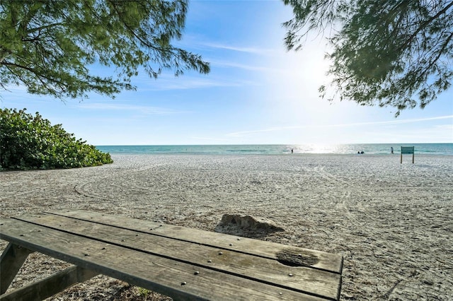 property view of water featuring a beach view