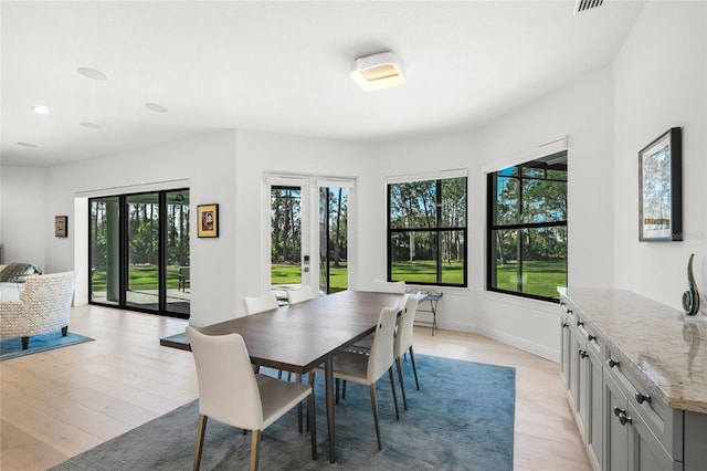 dining room featuring light wood-type flooring