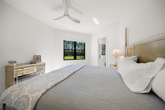 bedroom with connected bathroom and ceiling fan