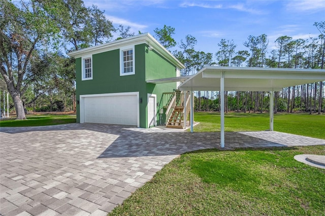 view of front facade with a front lawn and a garage