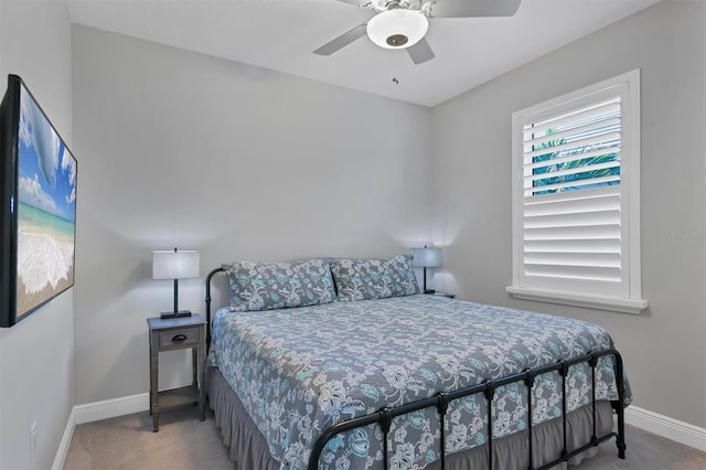 8089 Sandstar Way, Sarasota, FL 34240 - bedroom featuring carpet floors and ceiling fan
