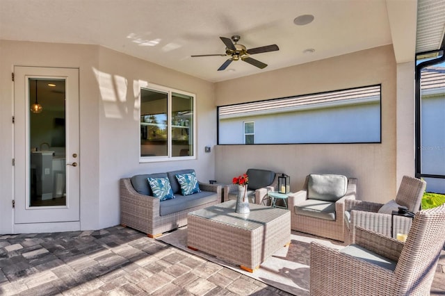 8089 Sandstar Way, Sarasota, FL 34240 - view of patio with an outdoor living space and a ceiling fan
