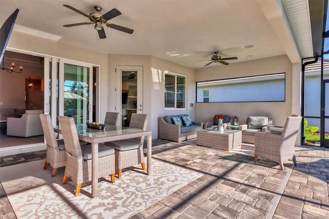 8089 Sandstar Way, Sarasota, FL 34240 - view of patio with a ceiling fan, outdoor lounge area, and outdoor dining space