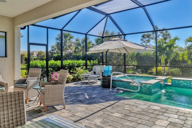 view of patio featuring pool water feature, glass enclosure, and a pool with hot tub