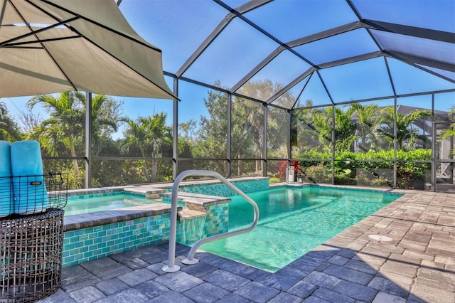 8089 Sandstar Way, Sarasota, FL 34240 - view of pool featuring a pool with connected hot tub, a patio area, and a lanai