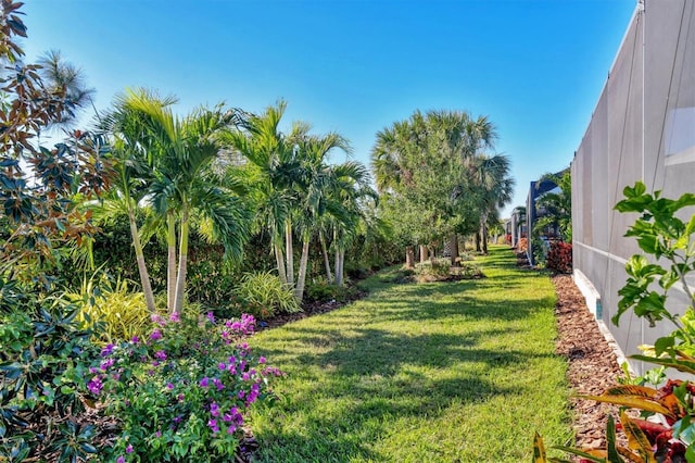 8089 Sandstar Way, Sarasota, FL 34240 - view of green lawn