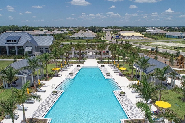 8089 Sandstar Way, Sarasota, FL 34240 - community pool with a residential view