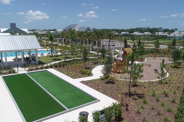 view of property's community featuring a playground