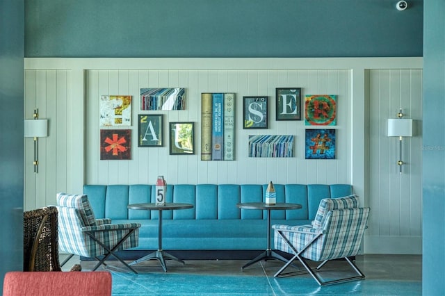 living area featuring concrete flooring