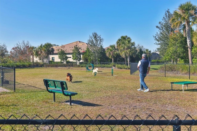 surrounding community featuring a yard