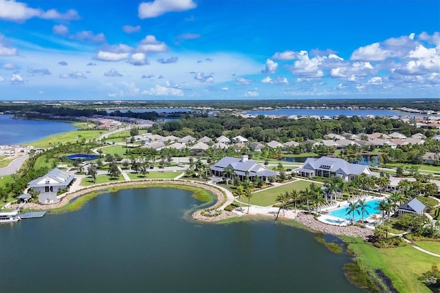 bird's eye view with a water view