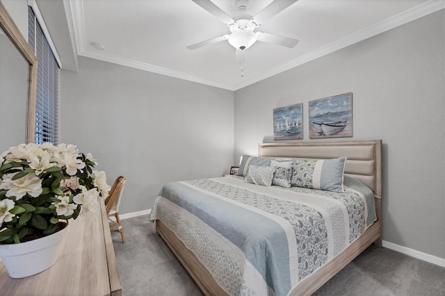 bedroom with ceiling fan, carpet floors, and ornamental molding