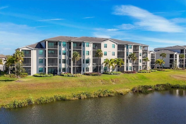 view of building exterior featuring a water view