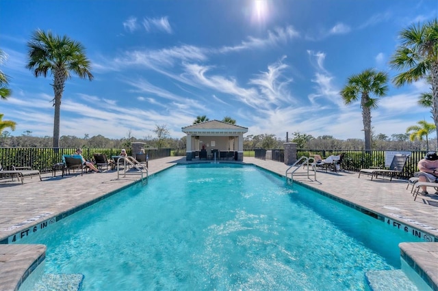 view of swimming pool featuring a patio