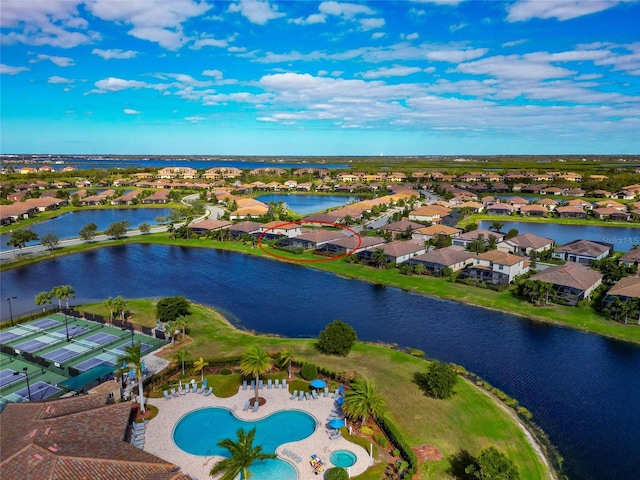 drone / aerial view with a water view