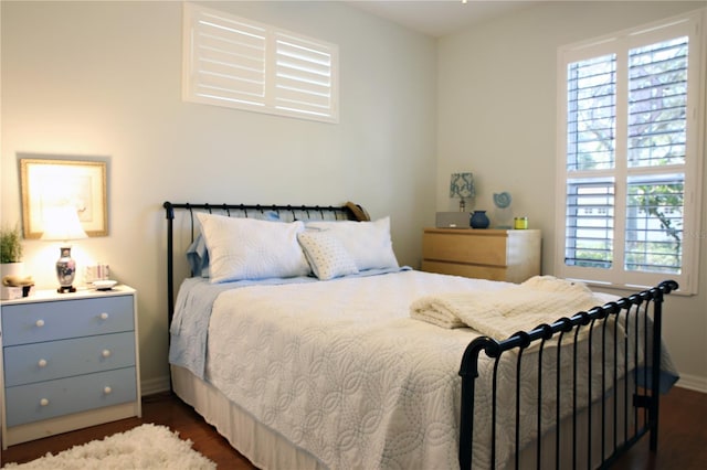 bedroom featuring dark hardwood / wood-style floors