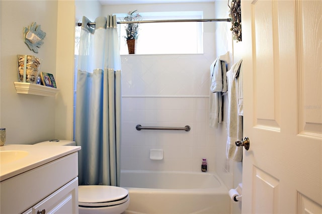 full bathroom with shower / bath combo, vanity, and toilet