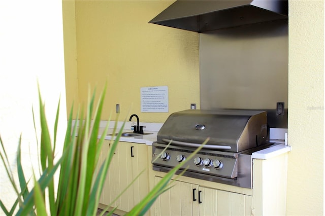 view of patio / terrace featuring grilling area, sink, and area for grilling