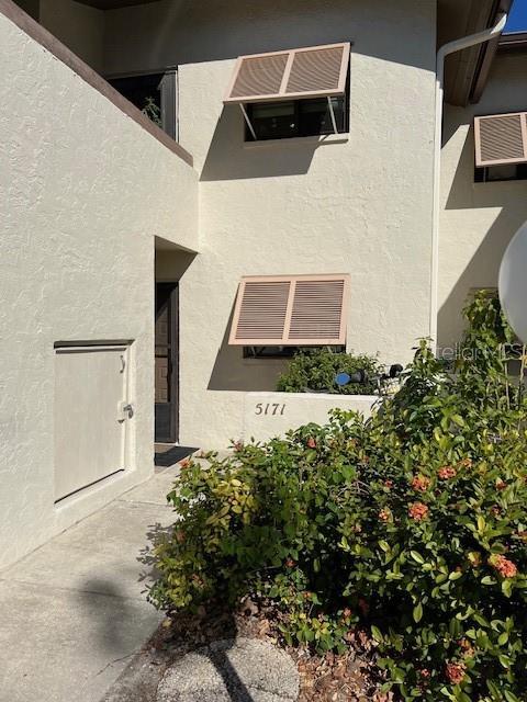 5171 Willow Links Unit 23, Sarasota, FL 34235 - property entrance featuring stucco siding