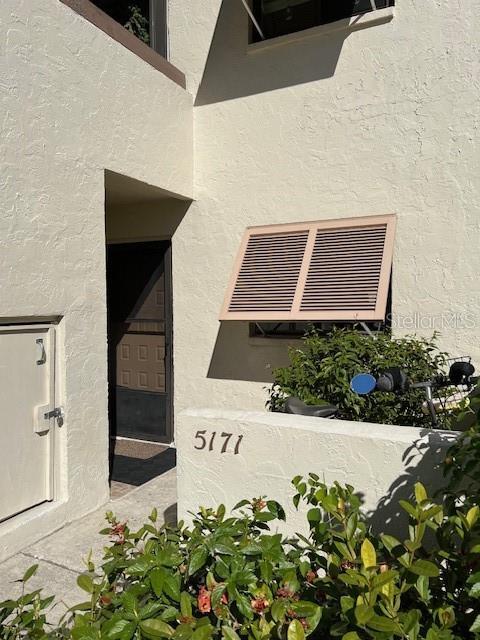5171 Willow Links Unit 23, Sarasota, FL 34235 - exterior view of stucco siding