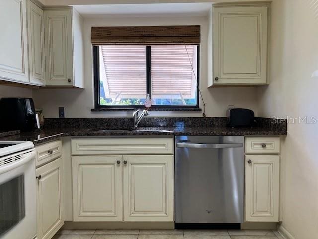 5171 Willow Links Unit 23, Sarasota, FL 34235 - kitchen with dishwasher, white range with electric cooktop, and dark stone countertops